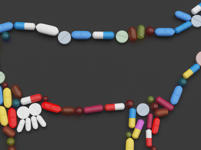 Brightly colored pills shaped into a cow